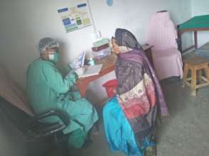 Dr Nahakul in his remote hospital in home-made PPE