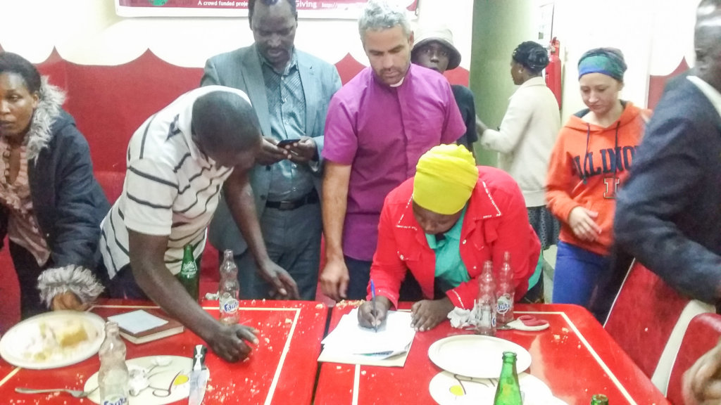 Signing and witnessing of handover documents