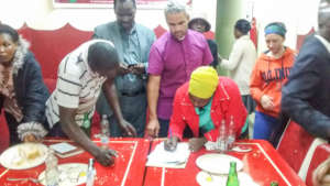Signing and witnessing of handover documents