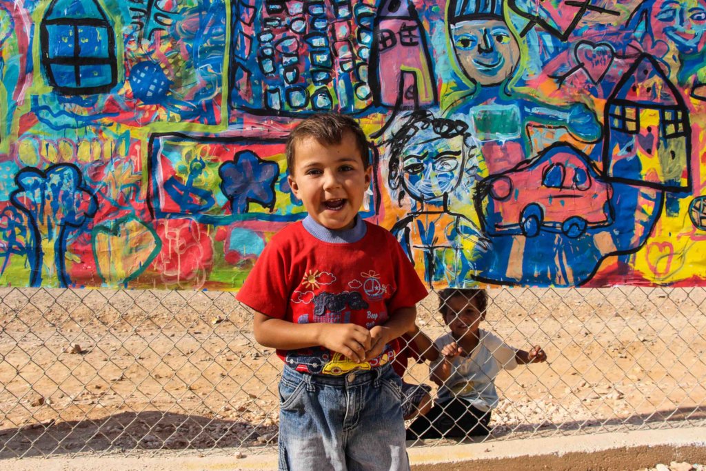 Paint murals with 300 Syrian Refugee children