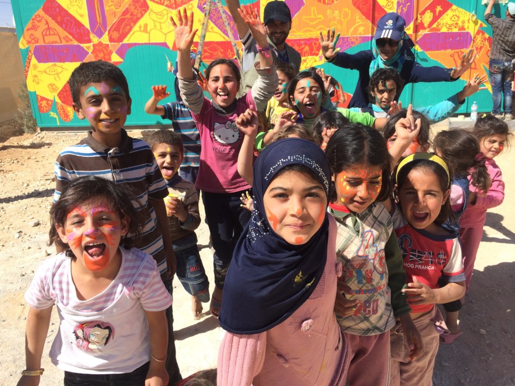 Paint murals with 300 Syrian Refugee children