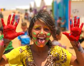 Paint murals with 300 Syrian Refugee children