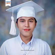 Photo of Arvin as he finished High School