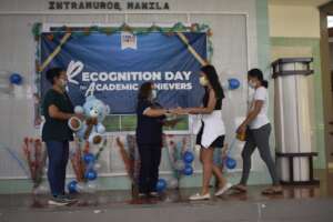 Awarding of certificate and token to graduates.