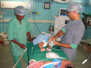 Anaesthetist getting Tanima ready for her surgery.