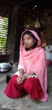 18 Year Old attending to domestic chores- cooking