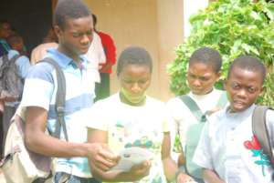 Students comparing answers at the end of ABC Exam