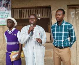 The school's Director addressing students