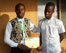 Nwagbodo receiving his certificate from ISERH ED
