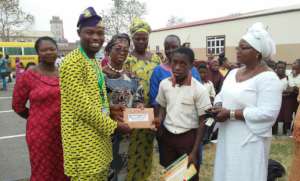 ISERH ED & Amb. Tosin flanked by his teachers