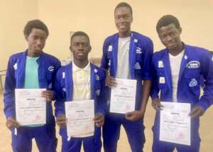 Four proud new graduates (Dakar)