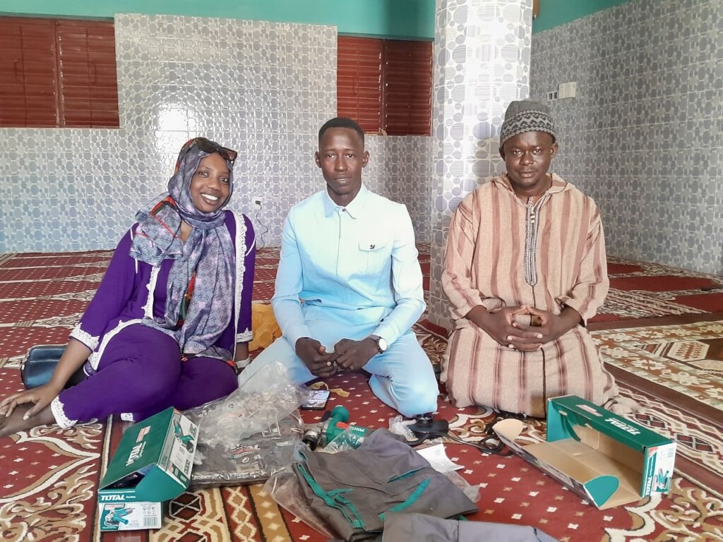 Projects manager Anta hand delivering the tools