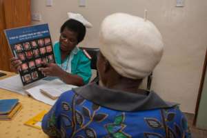 Nurse educates client about cervical cancer.