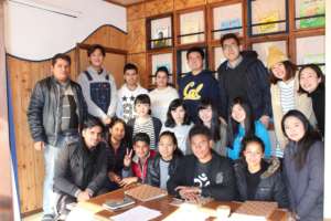 The youths meet with a local leader in Kesennuma