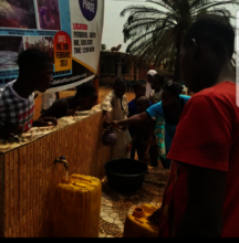 Rural dwellers fetching water from the platform