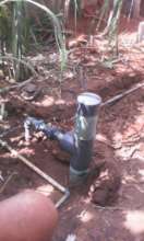 Artesian water source with completed plumbering