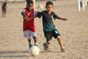 Mauripur U10s fight for the ball!