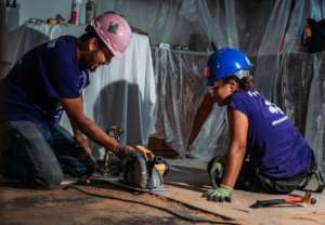 A site supervisor teaches an AmeriCorps member