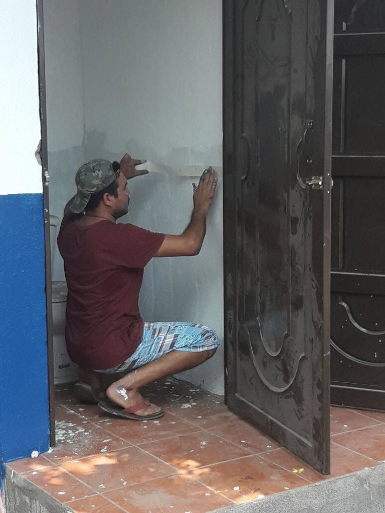lester priming the bathroom