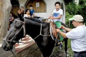 Now Secure with Encantada His Horse He Smiles