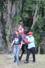 Gustavo works with volunteer from France