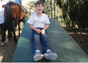Child waiting on new ramp for his turn  for riding