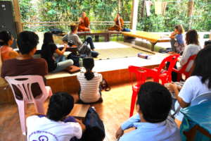 Students listen to Phra Paisal Visalo