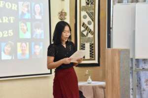 Mi Lai (nickname) Reading Her Poem on Closing Day