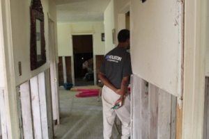 Homeowner during a visit assessing his gutted home