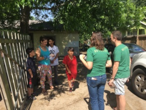 Volunteers offering resources to neighbors