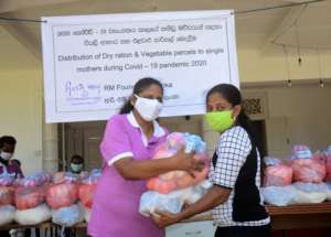 Single mum receiving emergency food parcel