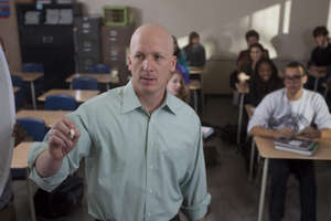 Kevin Blake and student-actors in classroom scene