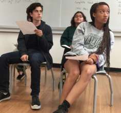Listening to the director during rehearsal