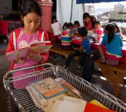 Kids enjoy donated books in Tihueliske Education