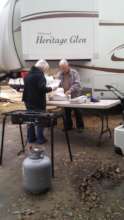 Gordon's Mom and Dad frying fish for volunteers