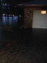 Flood water around the Hatthorn's home