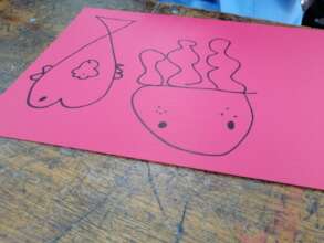 Drawing animals during art workshops.