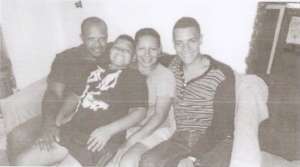 Brayan with his parents and younger brother