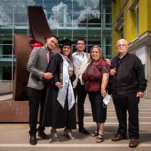 Yelibeth with her family during graduation