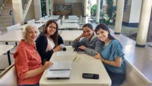 Prof. Beatriz with Roisdelyth, Yelibeth and Anyi