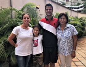 Jose David with his family during graduation
