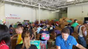 Volunteers working at Texas Diaper Bank warehouse