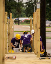 All Hands and Hearts volunteers building a home