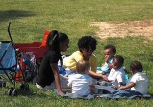 Infants enjoy a Week of the Young Child picnic