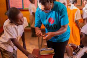 Bracelet making class with the children