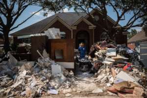 Removing debris after Hurricane Harvey