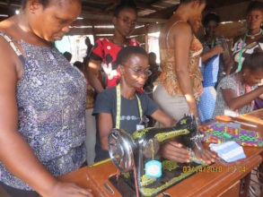 Trainees try out their hands on sewing machines