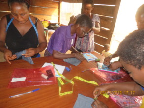 Participants practicing stitches