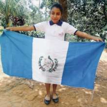 Elsy with the Guatemalan flag