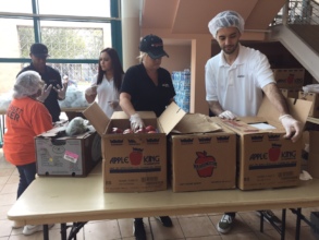 Cellular Sales volunteers lending a helping hand